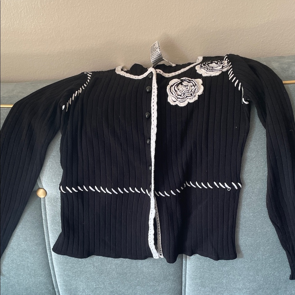 Black Ribbed Cardigan with White Floral Accents